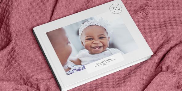 Que y-a-t-il à écrire dans votre livre photo de bébé Photobox ?