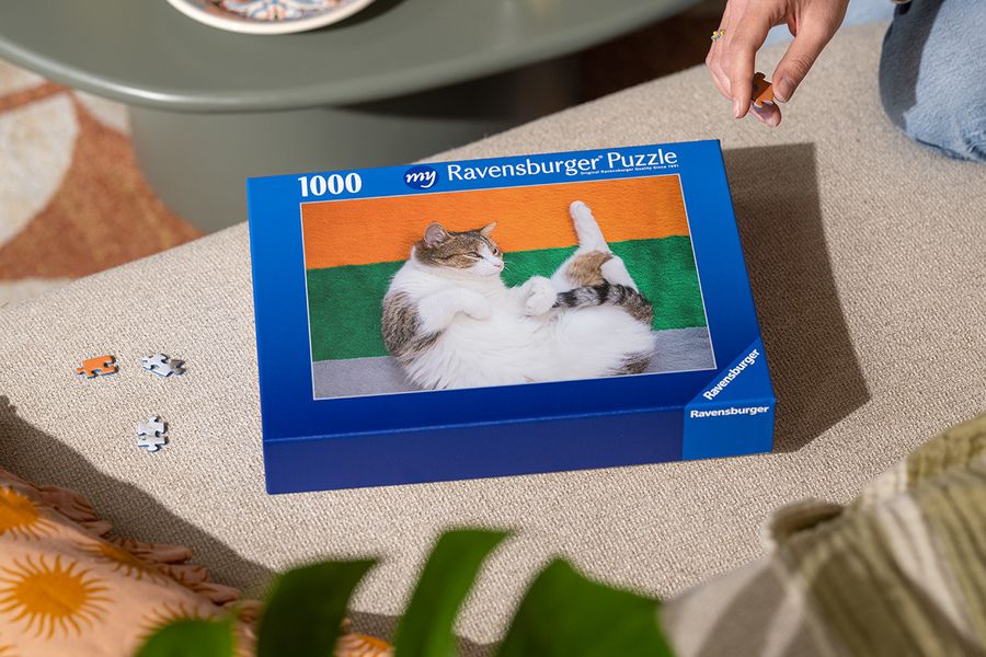 Un puzzle personnalisé Photobox avec un chat sur le devant, pour inspirer des jeux pour un goûter d’anniversaire et une fête enfant amusante.