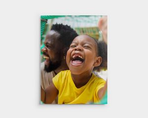 Une photo sur PVC d'un enfant qui rit.